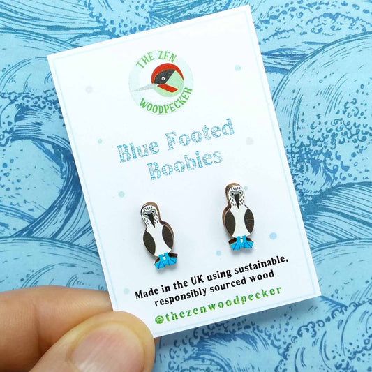 Wooden blue footed booby stud earrings on display card