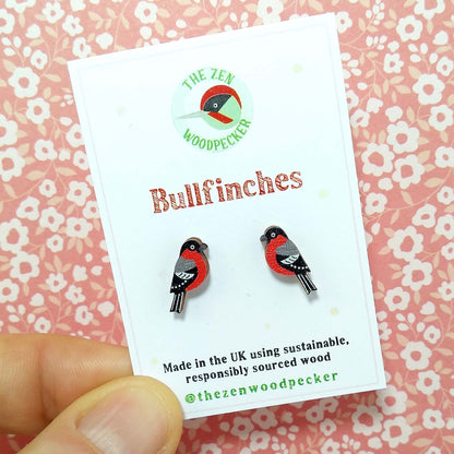 Wooden bullfinch stud earrings on display card