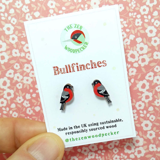 Wooden bullfinch stud earrings on display card