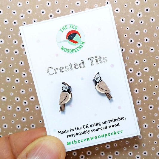 Wooden crested tit stud earrings on display card