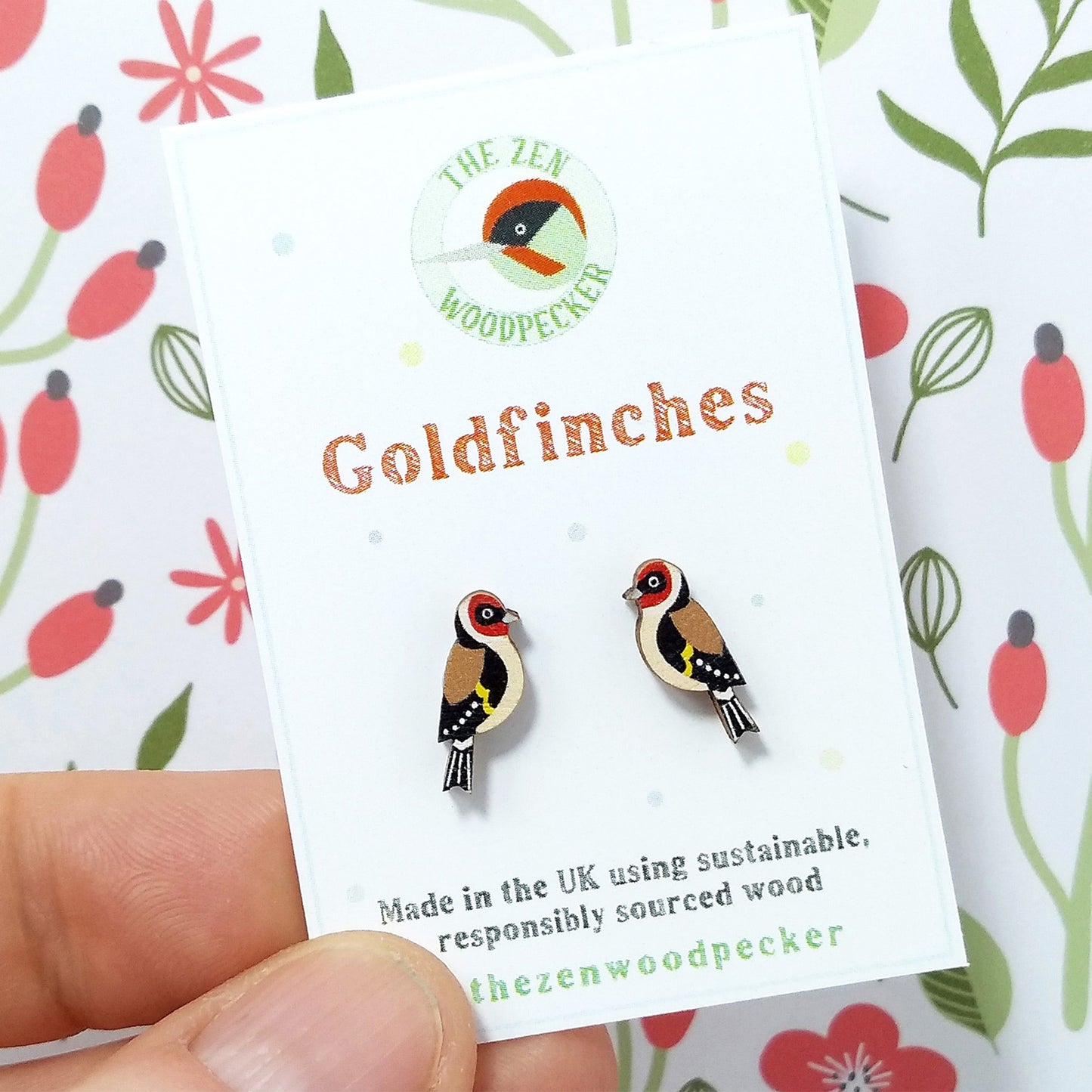 Wooden goldfinch stud earrings on display card