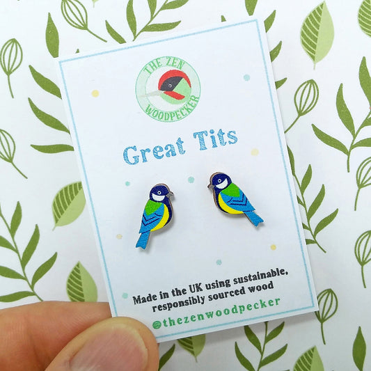 Wooden great tit stud earrings on display card