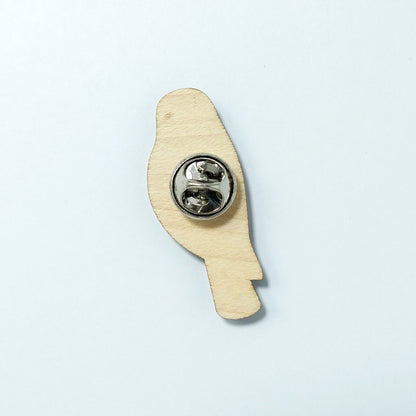 Back of kestrel pin badge showing metal butterfly clutch pin