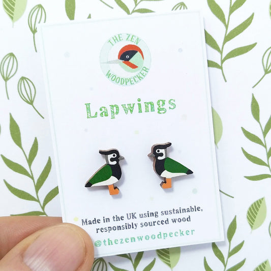 Wooden lapwing stud earrings on display card