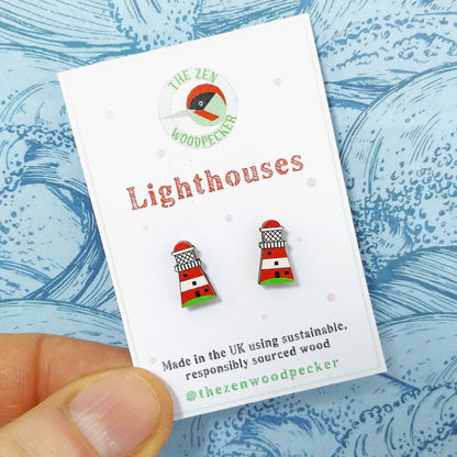 Wooden lighthouse stud earrings on display card