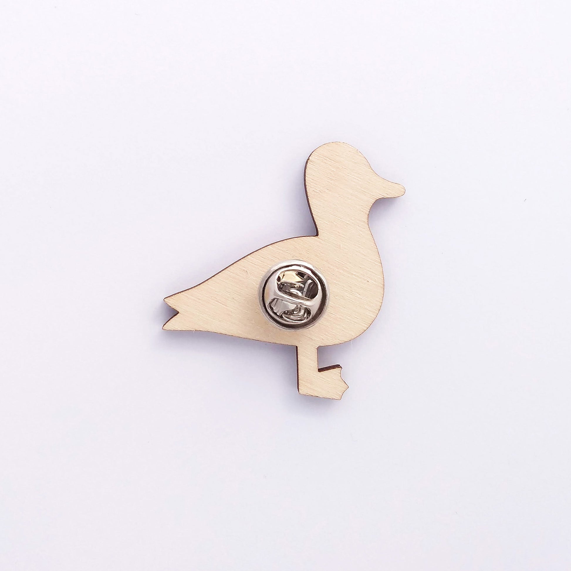 Back of mallard pin badge showing metal butterfly clutch pin