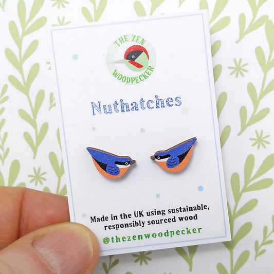 Wooden nuthatch stud earrings on display card