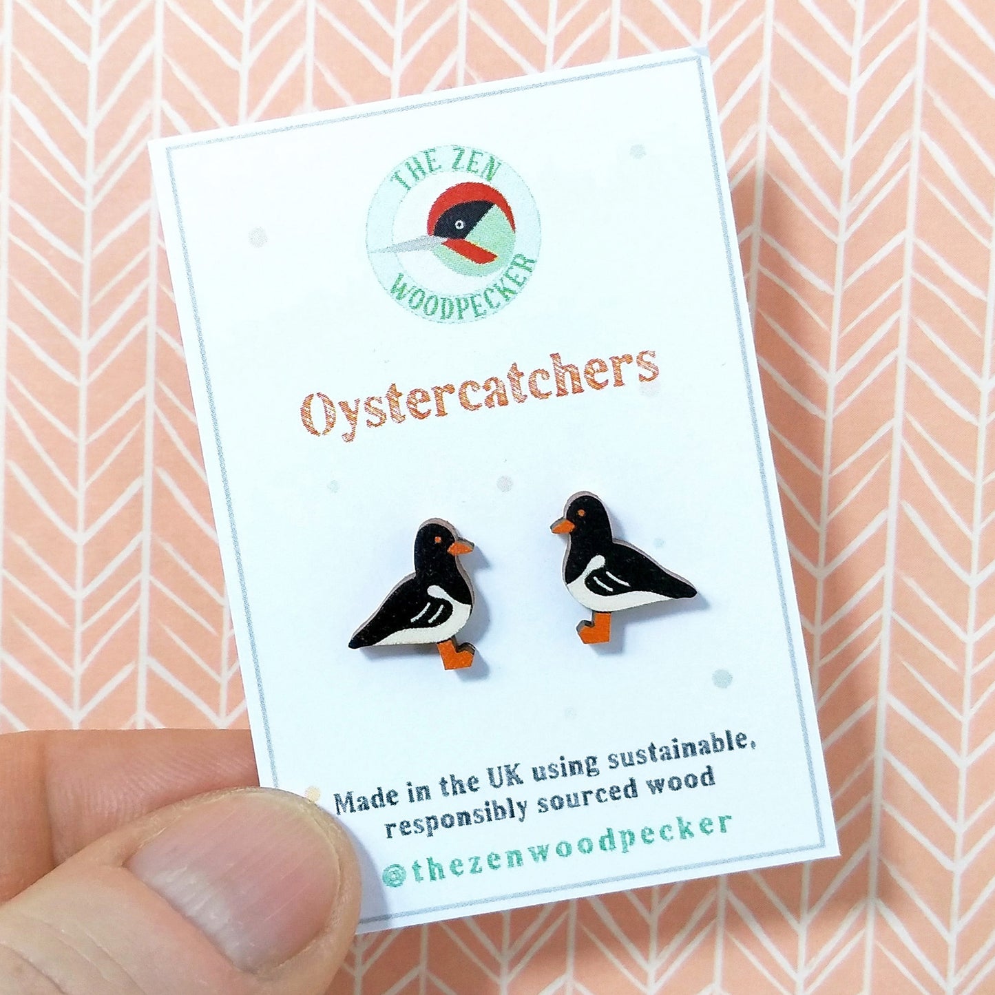 Wooden oystercatcher stud earrings on display card