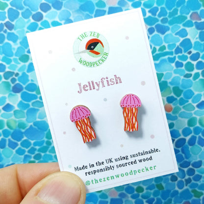 Wooden pink jellyfish stud earrings on display card
