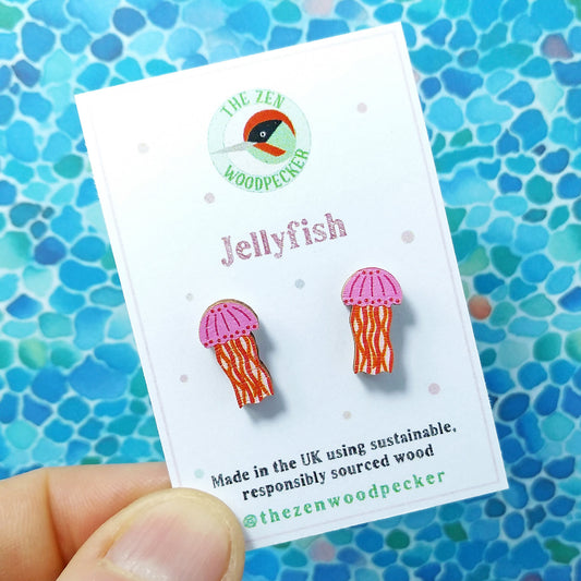Wooden pink jellyfish stud earrings on display card