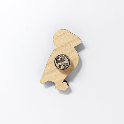 Back of puffin pin badge showing metal butterfly clutch pin