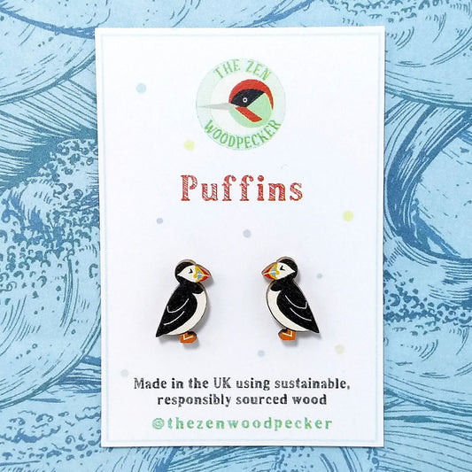 Wooden puffin stud earrings on display card