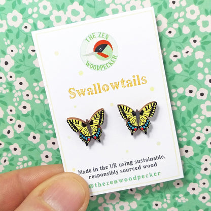 Wooden swallowtail butterfly stud earrings on display card