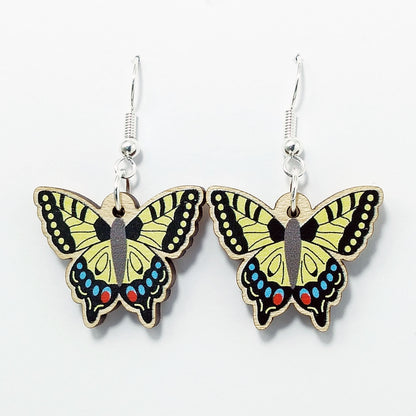 Wooden swallowtail dangle earrings on white background 