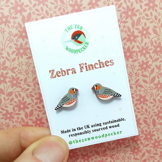 Wooden zebra finch stud earrings on display card