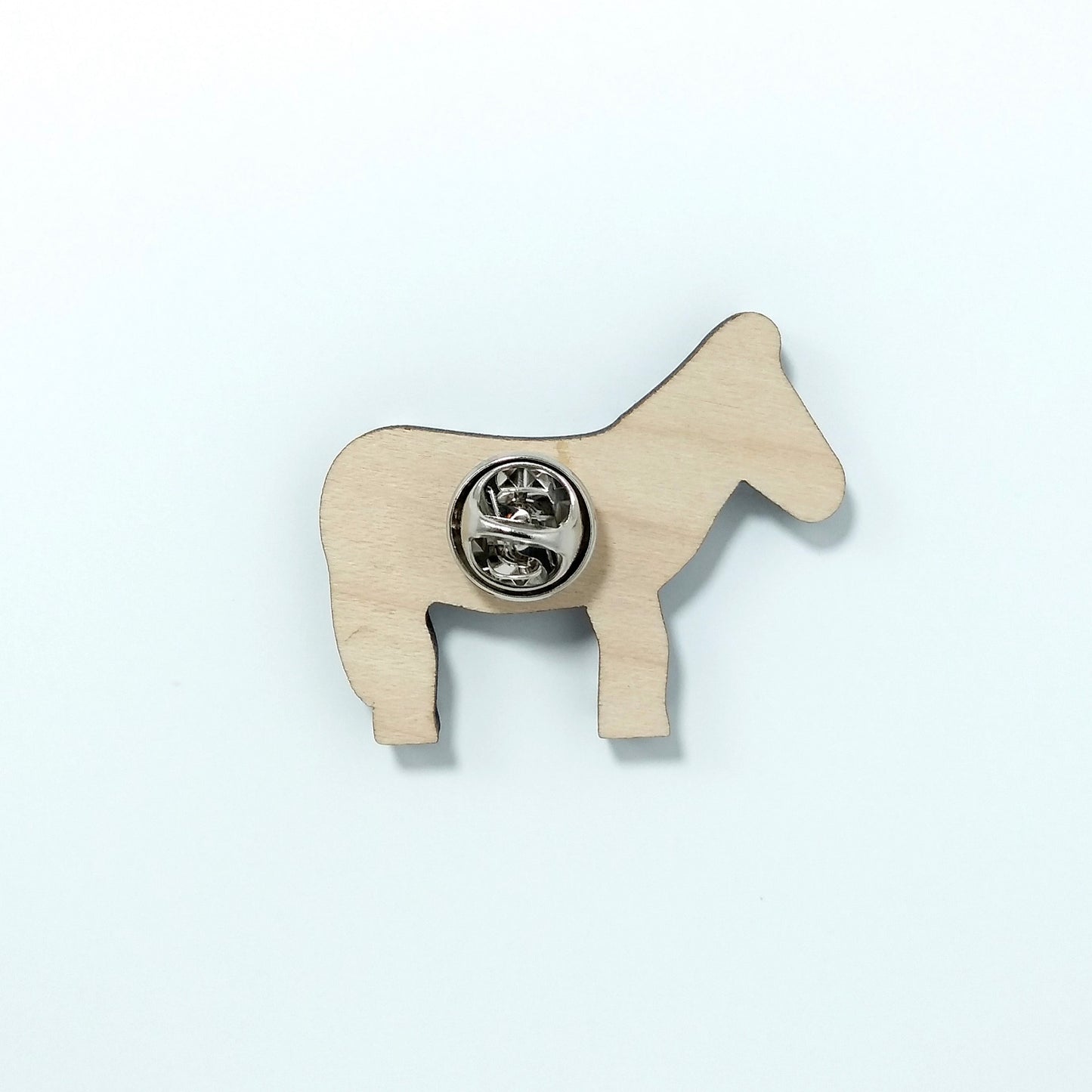 Back of zebra pin badge showing metal butterfly clutch pin
