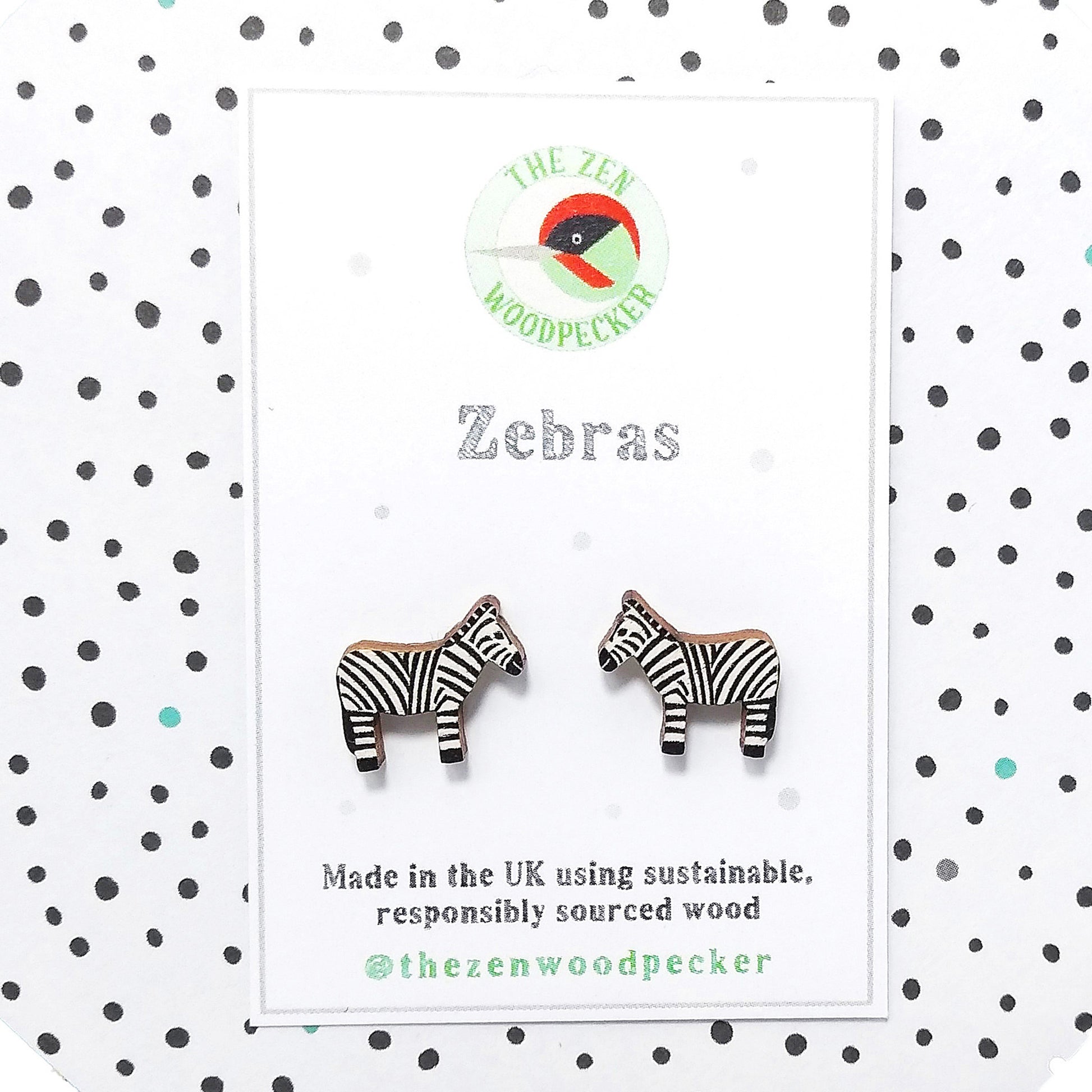 Wooden zebra stud earrings on display card